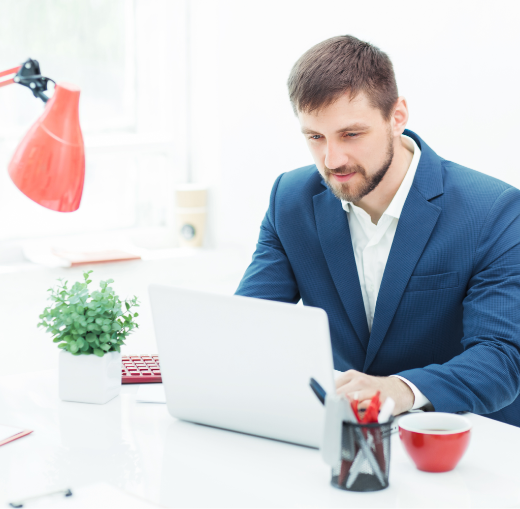 elegant-businessman-sitting-office 1
